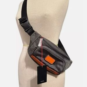NWT TUMI 126196 Grey/Orange/Black With Gunmetal Hardware Expandable Strap Waist